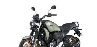 Yamaha FZ-X Hybrid Motorcycle Launched with TFT Display and Turn-by-Turn Navigation Front and side view of the Yamaha FZ-X Hybrid motorcycle in Matte Titan color, featuring a neo-retro design, LED headlamp, and TFT display.